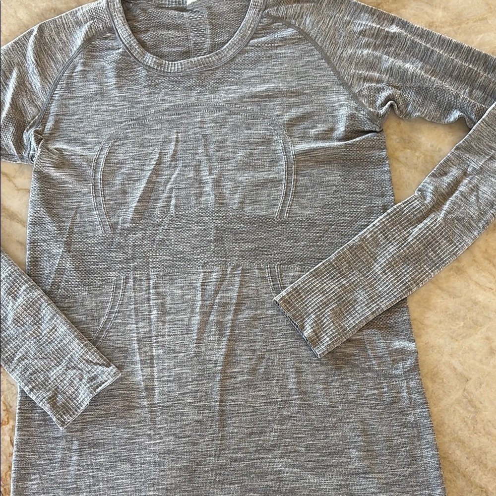 Gray  space dyed Long Sleeve swifty Top by LuLuLemon size 10